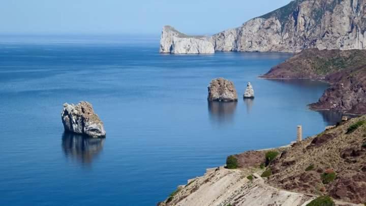 L'Estasi Tanca Piras A Bordo Piscina Con Vista Mare Villa Nebida Exteriör bild